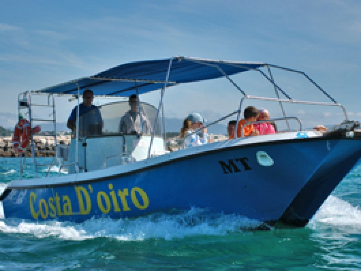 a group of people on a boat in the water